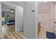 Hallway featuring access to a bunk room and a bathroom with a vanity at 555 Canterwood Dr, Mebane, NC 27302