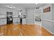 Spacious kitchen with modern appliances, white cabinets, and hardwood floors at 555 Canterwood Dr, Mebane, NC 27302
