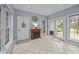 Living room with a fireplace, tiled flooring, and access to the deck at 555 Canterwood Dr, Mebane, NC 27302