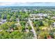 Aerial view displaying a residential neighborhood and the accessibility to community buildings at 612 E Academy St, Fuquay Varina, NC 27526