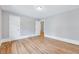 Bedroom featuring beautiful hardwood floors and neutral paint at 612 E Academy St, Fuquay Varina, NC 27526