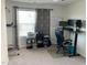 Bedroom featuring a desk setup, providing a functional and organized workspace in a comfortable living area at 6332 Andante Ave, Raleigh, NC 27616