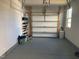 Spacious two-car garage with ample room for parking and storage, featuring neutral walls and concrete floors at 6332 Andante Ave, Raleigh, NC 27616