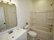 This bathroom features a bathtub and shower combination and a new vanity at 68 S Grace Way, Henderson, NC 27537