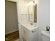 This bathroom features a new vanity, mirror, updated faucet, and light fixture at 68 S Grace Way, Henderson, NC 27537