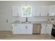 Modern kitchen with stylish countertops, stainless steel appliances, and contemporary fixtures at 68 S Grace Way, Henderson, NC 27537
