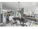 Bright dining area featuring an open floor plan, modern decor, and access to other living areas at 687 Bandon Aly, Cary, NC 27513