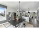 Bright dining area featuring modern decor, an open floor plan and large windows with attractive views at 687 Bandon Aly, Cary, NC 27513