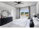 Bright primary bedroom boasts ample natural light and neutral color scheme, and a relaxing atmosphere at 687 Bandon Aly, Cary, NC 27513
