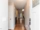 Inviting entryway with hardwood floors and a view into the open-concept living space at 706 Mossburn Ct, Fuquay Varina, NC 27526