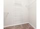 This walk-in closet provides ample storage with wire shelving units and neutral carpet at 72 E Moss Creek Dr, Clayton, NC 27520