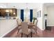 Dining area with furniture and natural light adjacent to the kitchen at 72 E Moss Creek Dr, Clayton, NC 27520