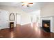 Spacious living room with hardwood floors, fireplace, and open floor plan at 72 E Moss Creek Dr, Clayton, NC 27520