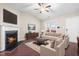 Inviting living room featuring a fireplace, high ceilings, and comfortable furnishings at 72 E Moss Creek Dr, Clayton, NC 27520