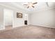 Spacious bedroom boasts plush carpet, neutral walls, and entry to a walk-in closet at 72 E Moss Creek Dr, Clayton, NC 27520