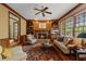 Inviting living room boasts a fireplace, built-in bookshelves, and an expansive rug at 7709 Oakmont Pl, Raleigh, NC 27615