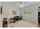Home office with desk, chair, and views of the outdoors at 7709 Oakmont Pl, Raleigh, NC 27615
