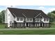 Beautiful townhome featuring brick accents, modern colors, covered entrances and well manicured landscaping at 801 Fireship Rd, Fuquay Varina, NC 27526
