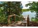 Take the gravel path down to the lake and enjoy the view on the dock at 801 Hyperion Aly, Wake Forest, NC 27587