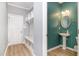 Charming bathroom with a pedestal sink and stylish lighting fixtures at 8021 Crookneck Dr, Angier, NC 27501