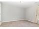 Cozy bedroom featuring carpeted floors and a bright window with curtains at 8021 Crookneck Dr, Angier, NC 27501