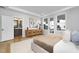 Bright primary bedroom with a closet, full bathroom, and access to a private balcony at 811 Fireship Rd, Fuquay Varina, NC 27526