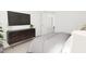 Bedroom with a chic dresser featuring stylish decor and modern design elements creating a serene space at 813 Fireship Rd, Fuquay Varina, NC 27526
