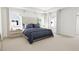 Inviting bedroom featuring plush bedding, natural light, and a serene atmosphere at 813 Fireship Rd, Fuquay Varina, NC 27526