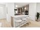 Beautiful kitchen with stainless steel appliances, custom cabinets, and a convenient breakfast bar at 813 Fireship Rd, Fuquay Varina, NC 27526