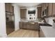 Contemporary kitchen featuring stainless steel appliances, wood cabinets, and lots of counter space at 813 Fireship Rd, Fuquay Varina, NC 27526
