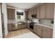 Well-appointed kitchen with stainless steel appliances, ample counter space, and wooden cabinetry at 813 Fireship Rd, Fuquay Varina, NC 27526