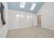 Vaulted ceiling bedroom with blue ceiling, two skylights and neutral carpet at 88 Eltham, Rocky Mount, NC 27804