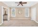 Primary bedroom features a private bathroom entrance and a view of bright, window lighting at 88 Eltham, Rocky Mount, NC 27804