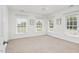 Bright bedroom with three windows offering natural light and backyard views at 88 Eltham, Rocky Mount, NC 27804