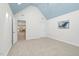 Large bedroom with neutral carpet, vaulted ceiling, art and two doorways at 88 Eltham, Rocky Mount, NC 27804