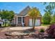Lovely brick home with a screened porch and a two-car garage at 88 Eltham, Rocky Mount, NC 27804