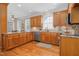 Spacious kitchen features hardwood floors, granite countertops, and stainless steel appliances at 88 Eltham, Rocky Mount, NC 27804