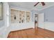 Versatile office space with built-in shelving, hardwood floors, and a view of the entry way and a hallway at 88 Eltham, Rocky Mount, NC 27804