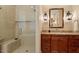 Modern bathroom featuring a glass-enclosed shower and a vanity with elegant lighting at 919 Woodham, Pittsboro, NC 27312
