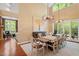Stunning dining area with french door and high ceiling at 919 Woodham, Pittsboro, NC 27312