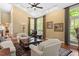 Bright living room with tall ceiling and large windows at 919 Woodham, Pittsboro, NC 27312