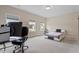 Spacious bedroom with large windows and a work space at 956 The Parks Dr, Pittsboro, NC 27312