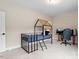 Cozy bedroom with a custom bunk bed and desk at 956 The Parks Dr, Pittsboro, NC 27312