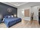Stylish bedroom with a modern tray ceiling and an en-suite bathroom at 956 The Parks Dr, Pittsboro, NC 27312