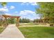 Inviting community green space featuring walking paths, pergolas, and seating areas at 956 The Parks Dr, Pittsboro, NC 27312