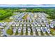 Aerial view of a neatly planned residential community with tree-lined streets and manicured landscapes at 1018 Sweet Cream Ct, Durham, NC 27703