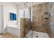 Bathroom showcasing a tiled shower with glass enclosure and a soaking tub under a decorative window at 1018 Sweet Cream Ct, Durham, NC 27703
