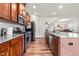 Modern kitchen featuring stainless steel appliances, plenty of counter space, and sleek design at 1018 Sweet Cream Ct, Durham, NC 27703