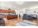 Open layout showcasing the kitchen, living room, and dining area with modern decor at 1018 Sweet Cream Ct, Durham, NC 27703