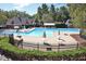 Community pool with well-maintained amenities, perfect for summer relaxation and social gatherings at 102 Windrock Lane, Cary, NC 27518